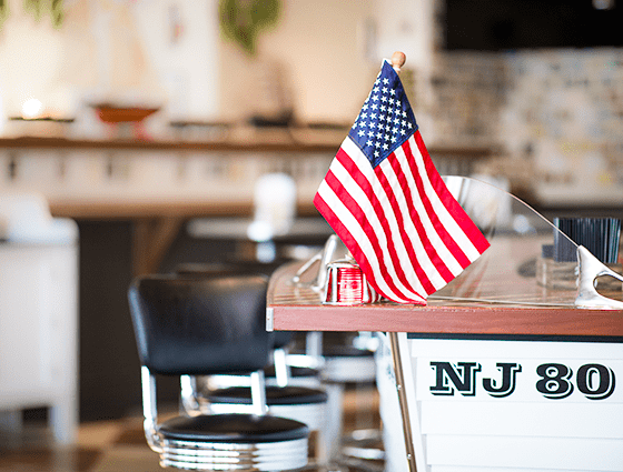 A small American flag on the bar in The Windlass